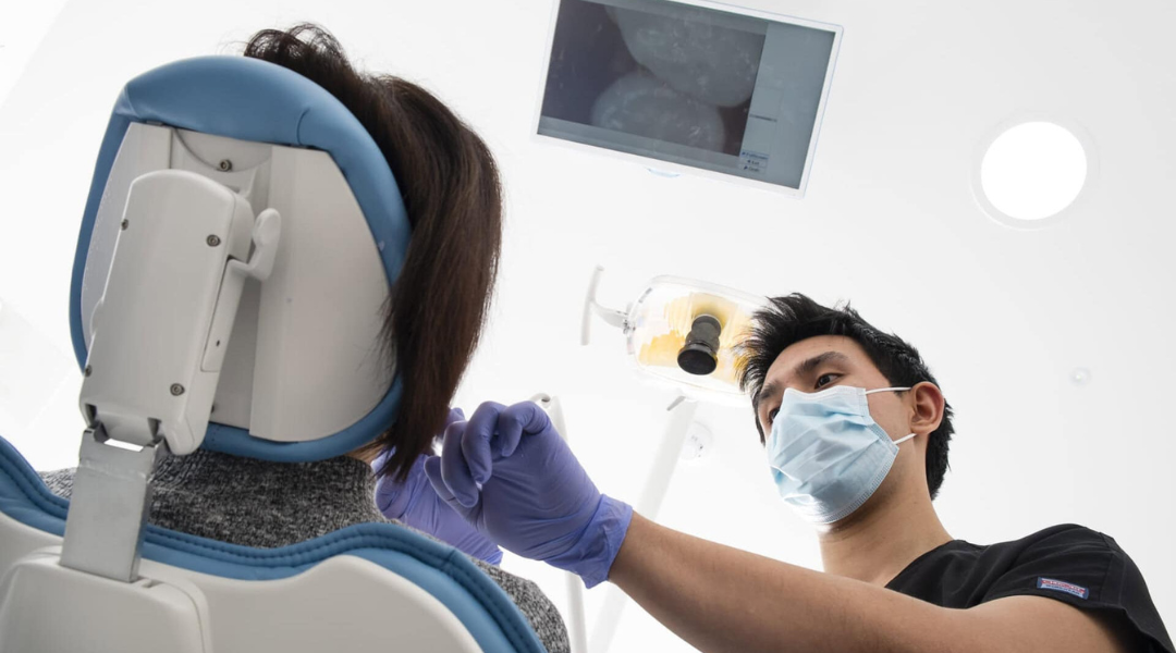 a ball with a smiley face surrounded by balls