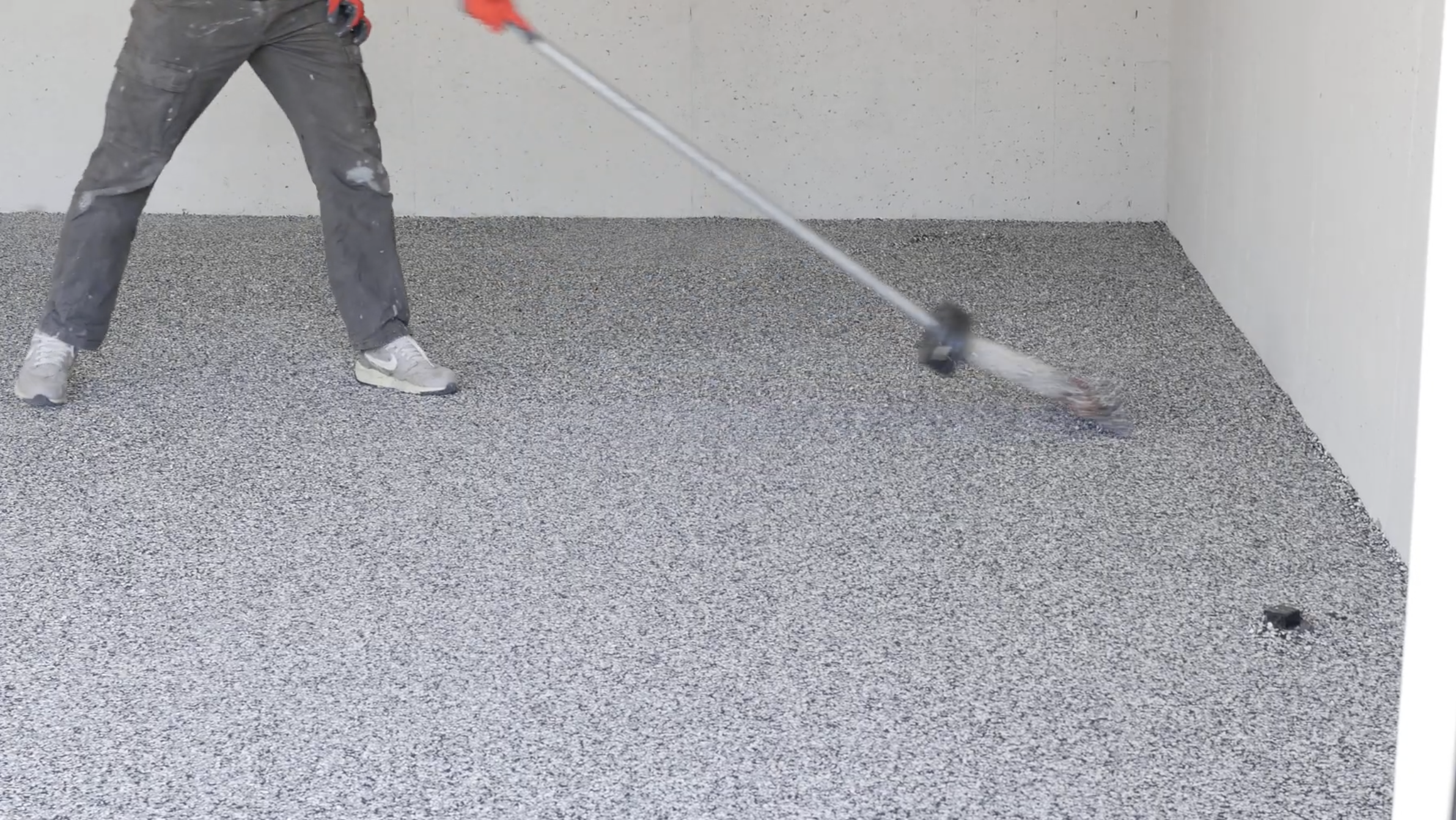 Full broadcast vinyl flake blend applied to epoxy garage floor in Kansas City