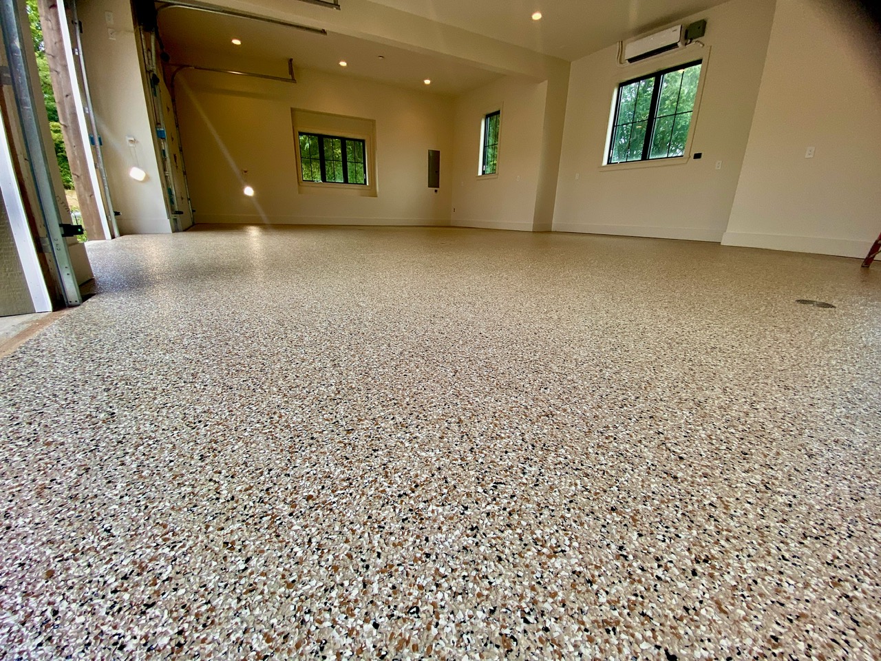 Gray flake polyaspartic garage floor coating Kansas City Missouri