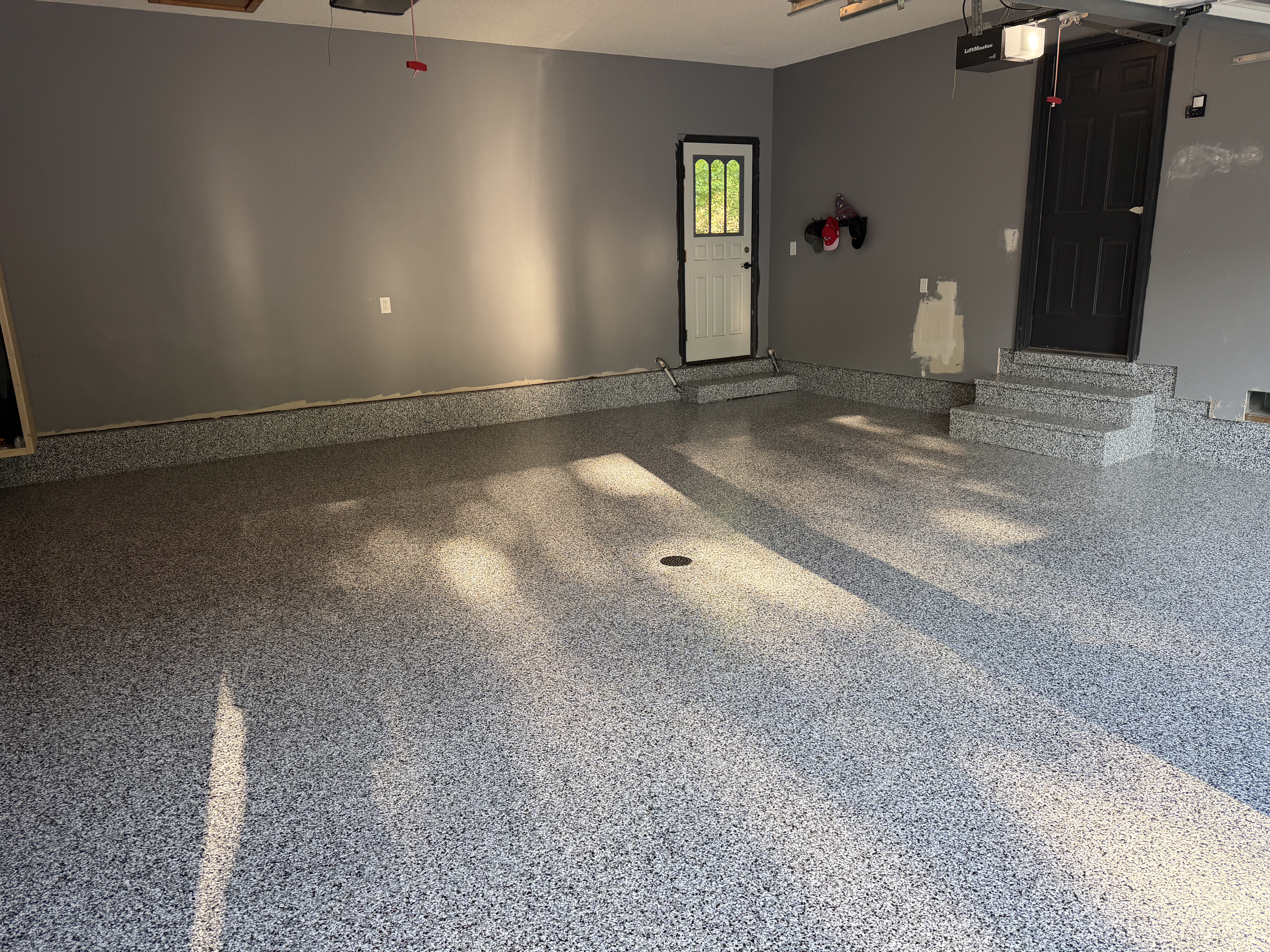 Rebar repairs finished garage floor coating Kansas City