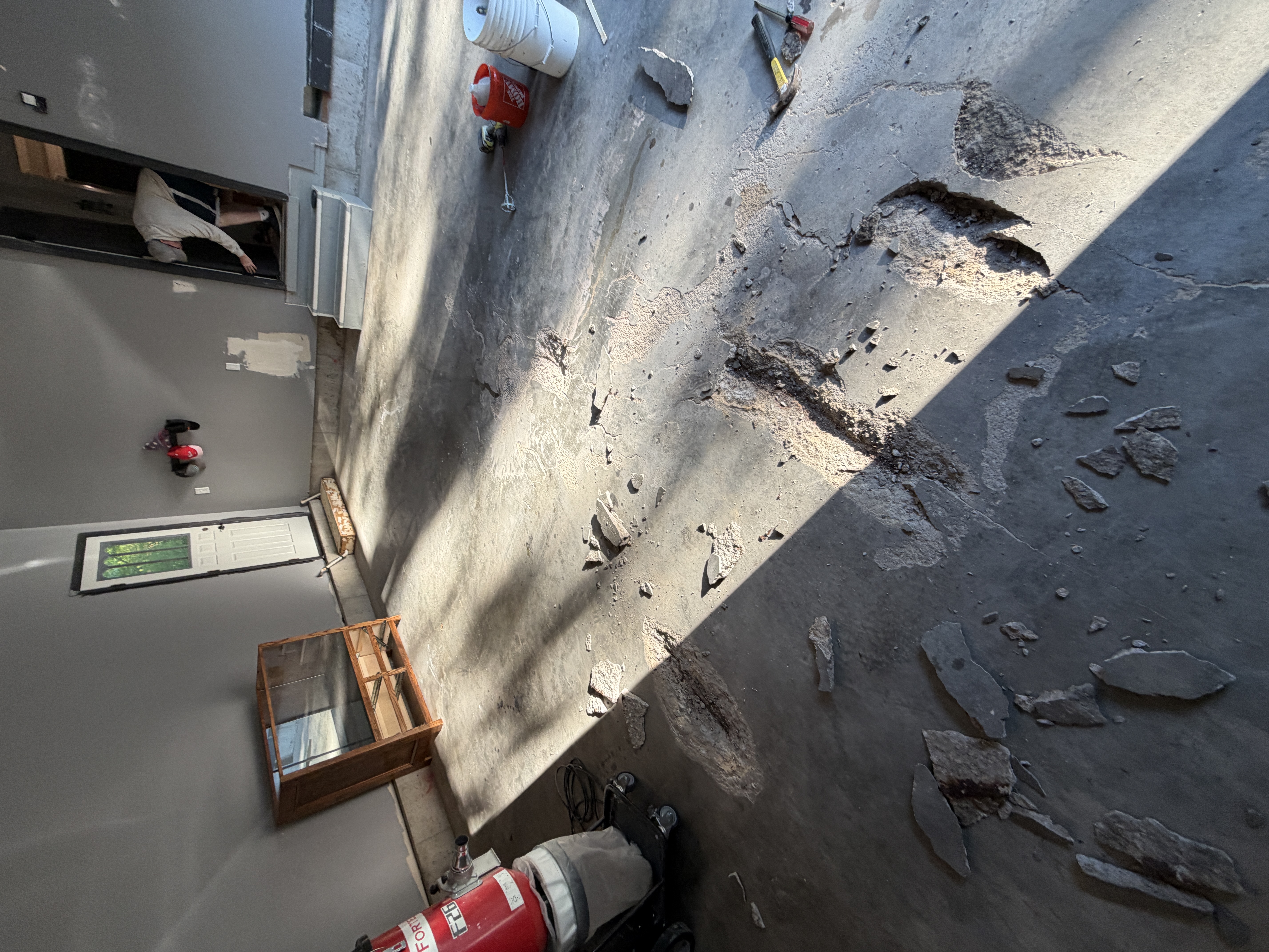 Rebar damage before garage floor coating Kansas City