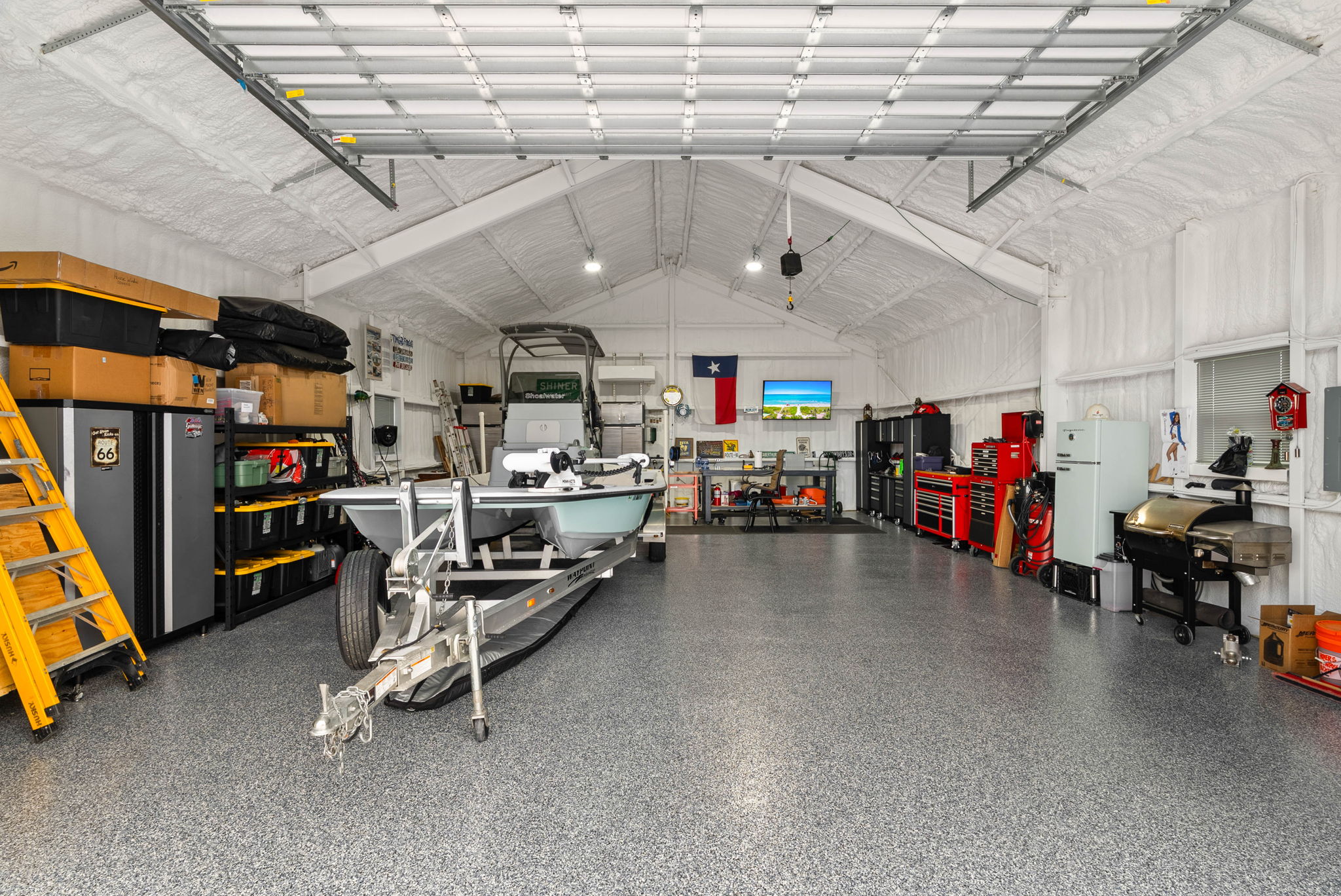 Large detached workshop with epoxy floors and classic car inside