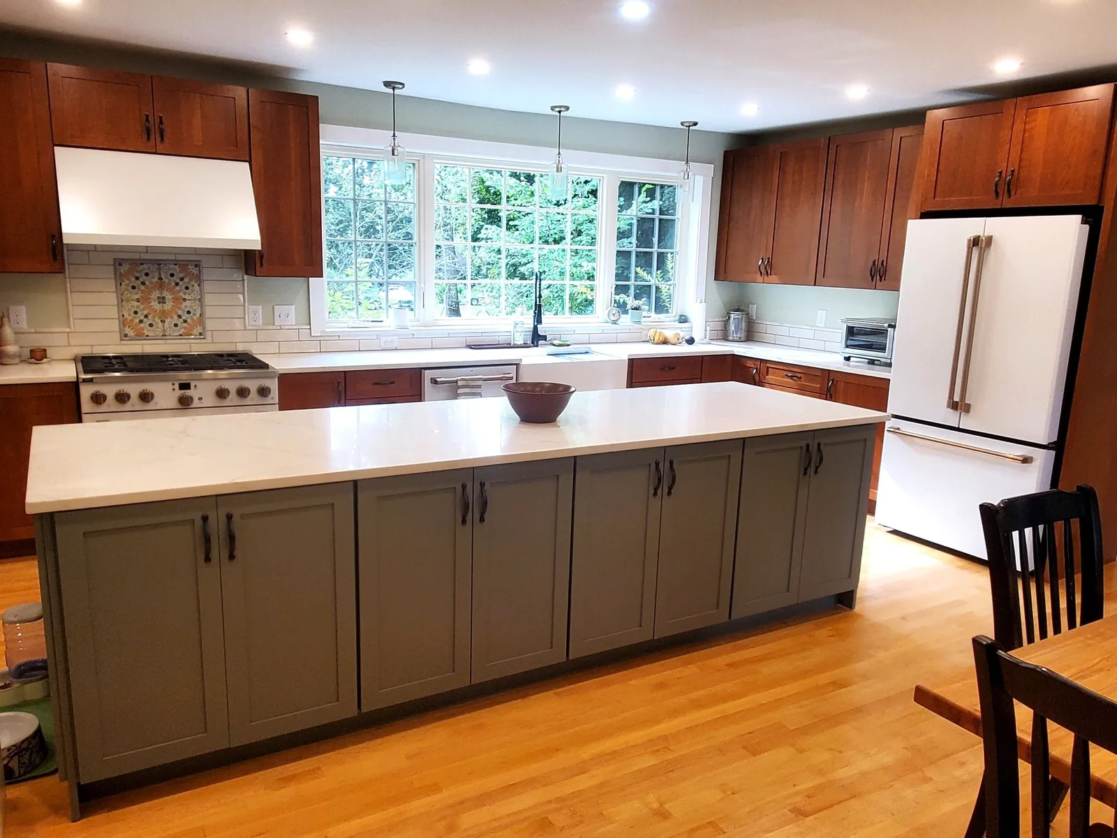 Kitchen island and cabinetry in a remodeled home