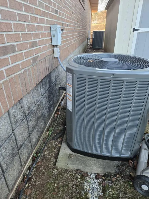 Alabama Cooling and Heating technician at work