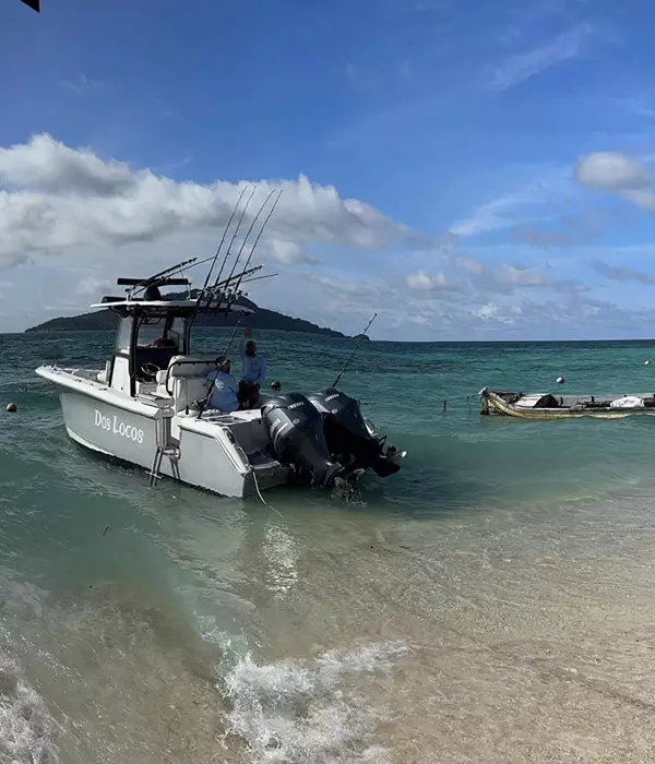 center console fishing boat beached backwards