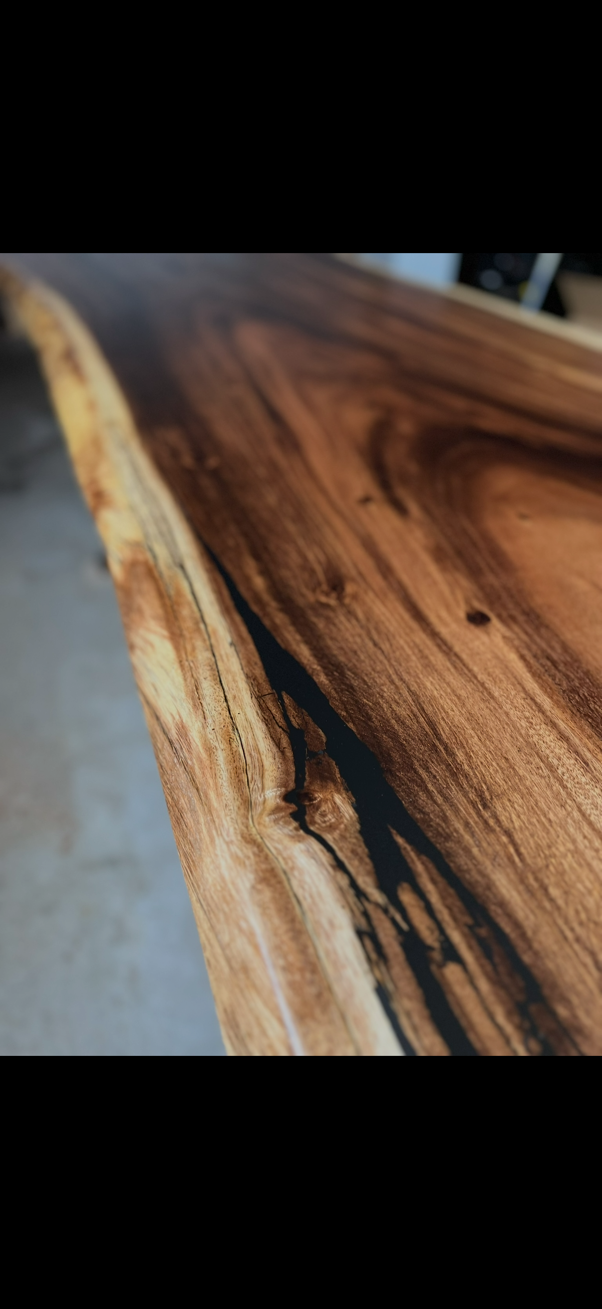 Long live edge conference table installed in a client's space, seating along both sides