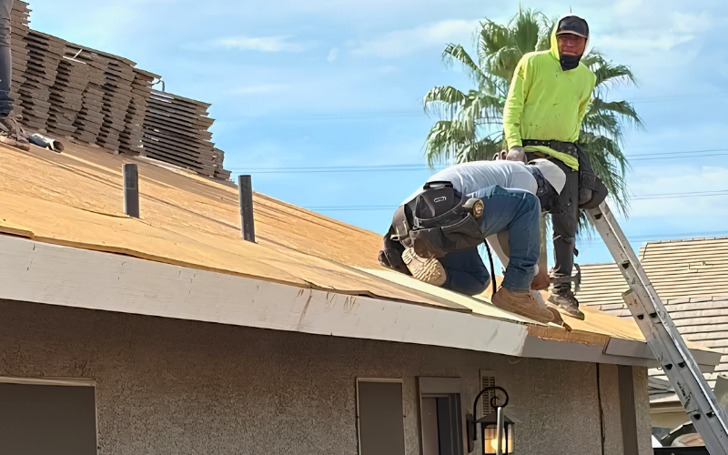 Mulcock Roofing inspector evaluating East Valley home roof