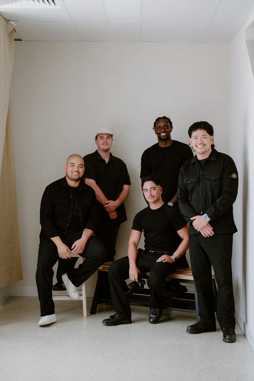 The five members of the By Hidden Leaf crew photographed together in a studio