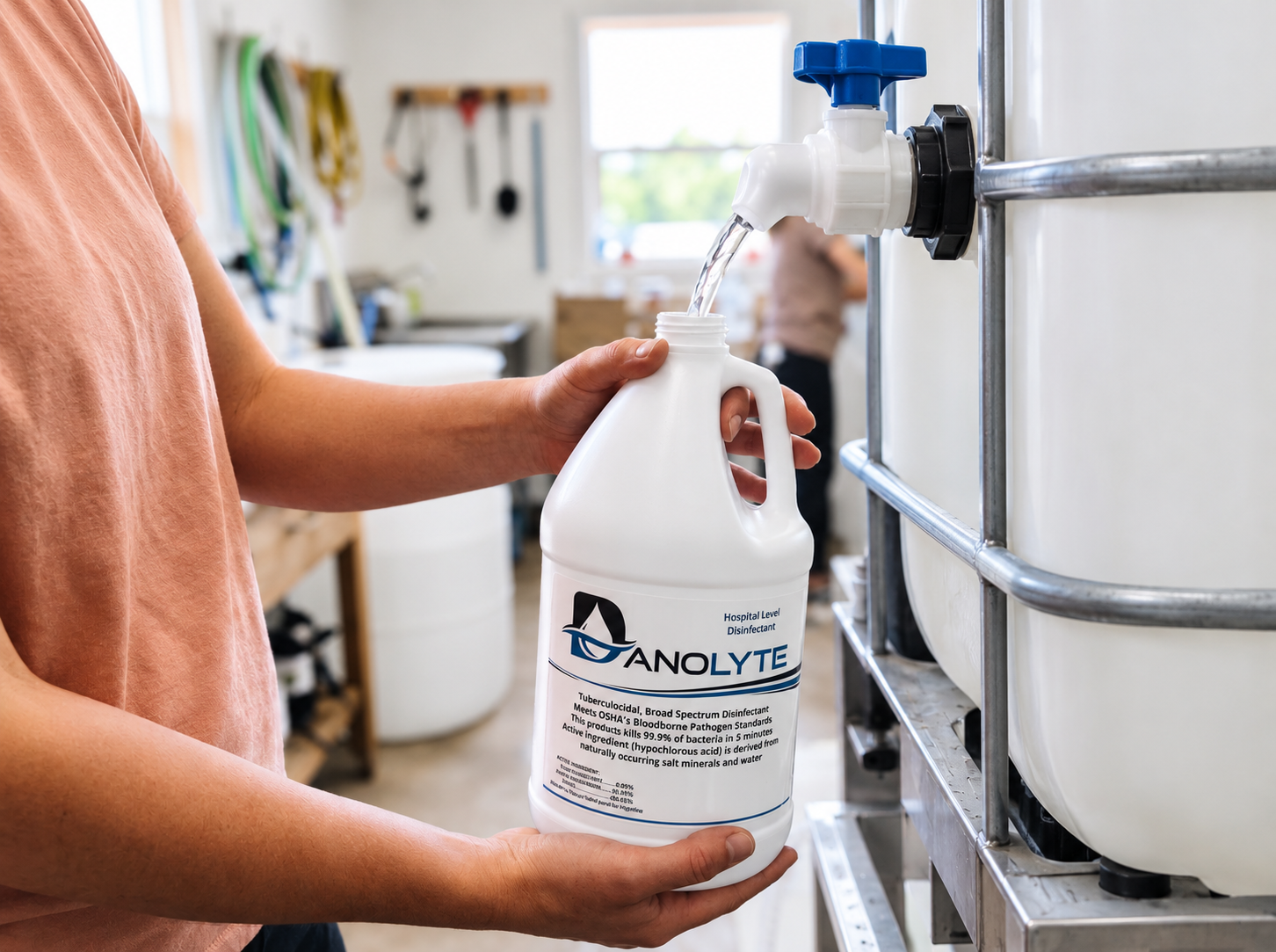 Danolyte Global's president filling a bottle of Danolyte Disinfectant at the generator in Overland Park, Kansas
