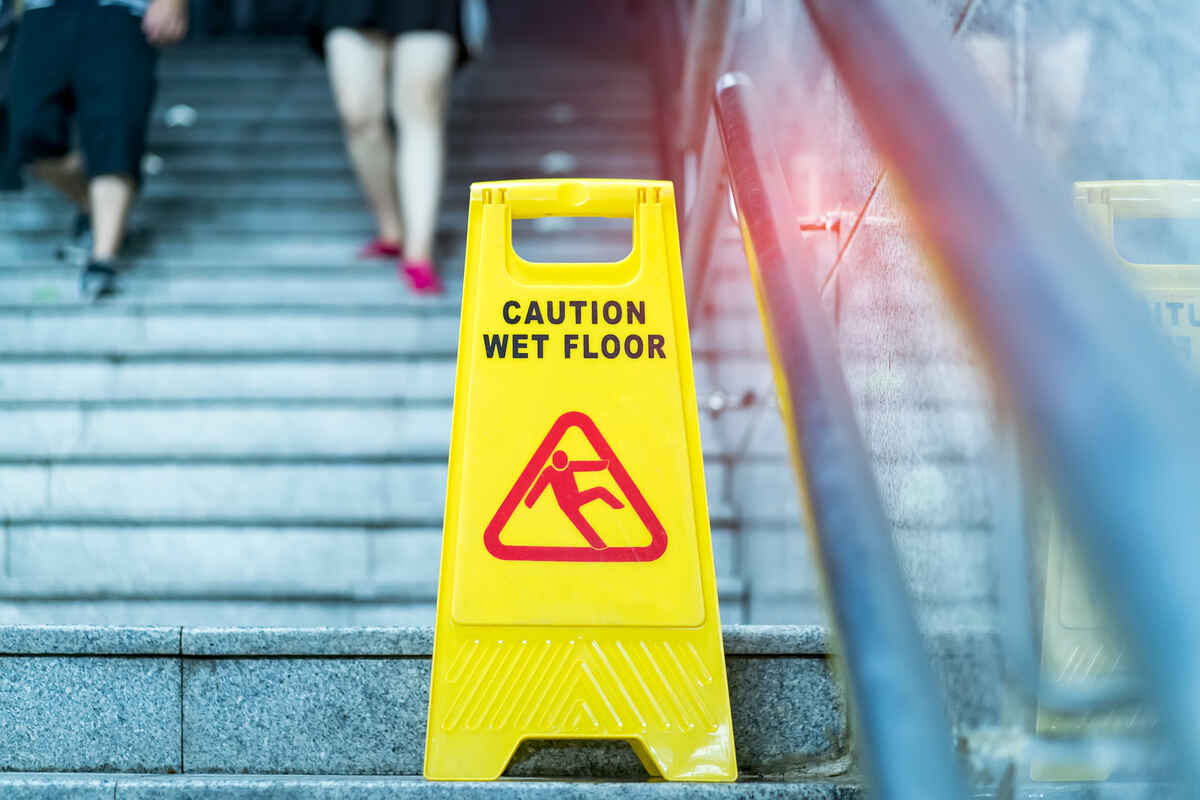 slippery-when-wet-sign--entrance-slip-and-fall-liability-concerns slippery-when-wet-sign--entrance-slip-and-fall-liability-concerns