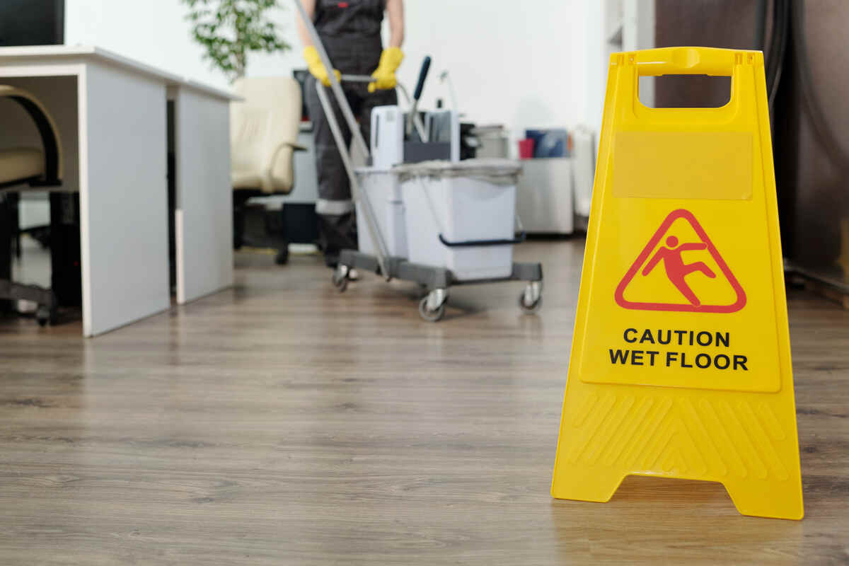 certified-technician-performing-floor-traction-testing-inside-office-building certified-technician-performing-floor-traction-testing-inside-office-building
