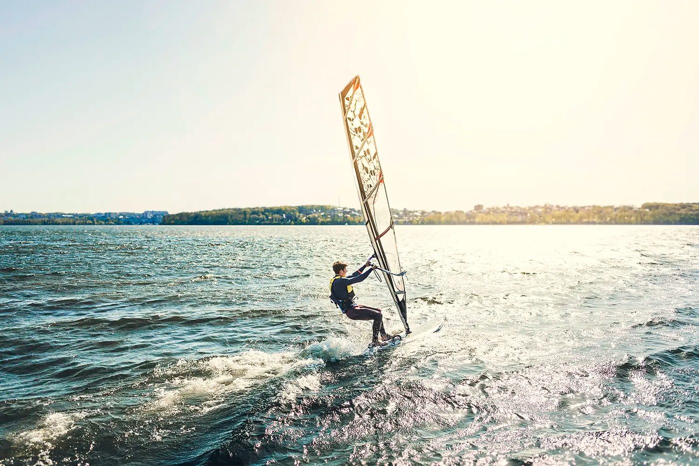 Kayaks and paddleboards drawn up on the turquoise lagoon