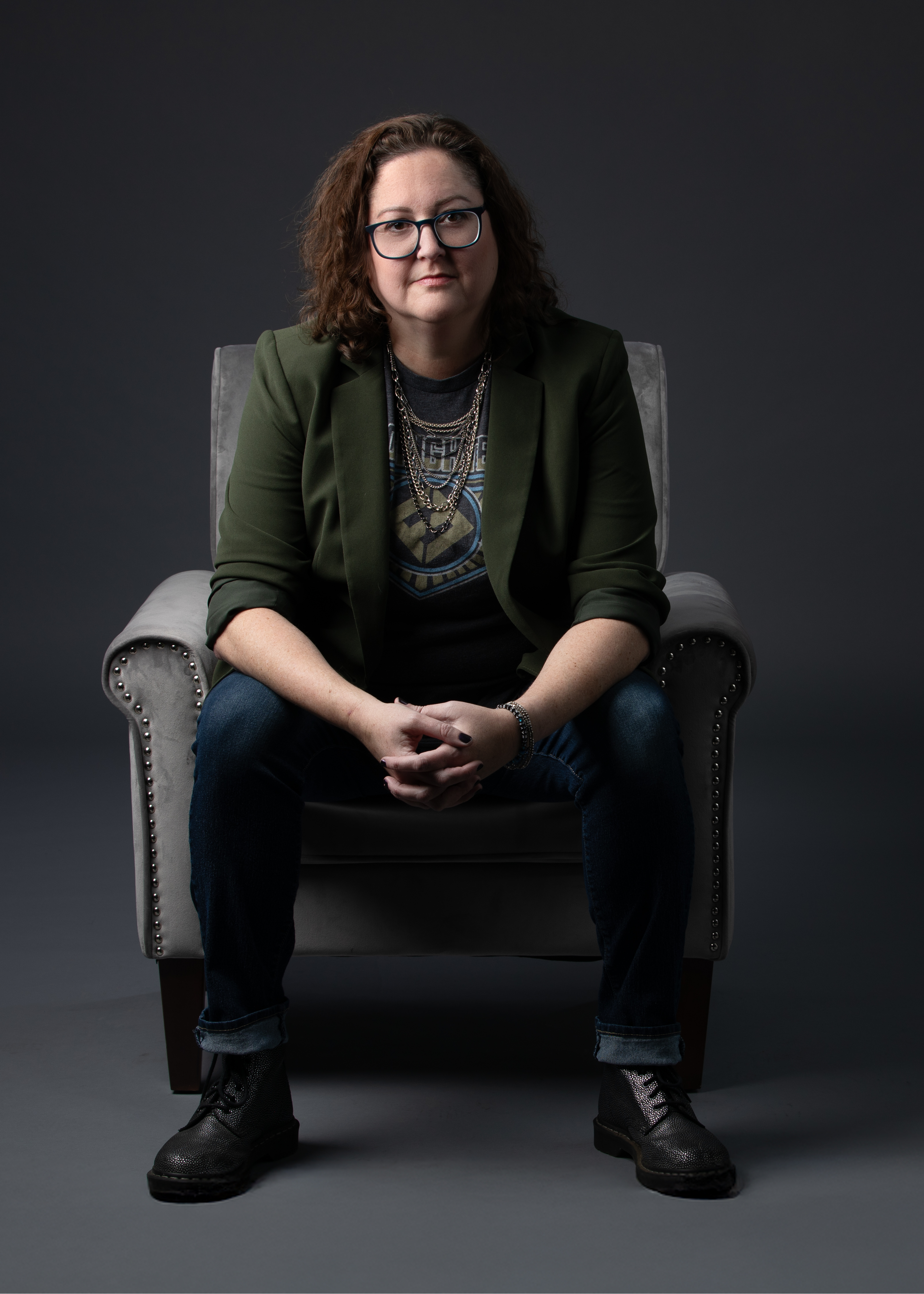 Teresa Kulupka — personal branding portrait, seated in studio