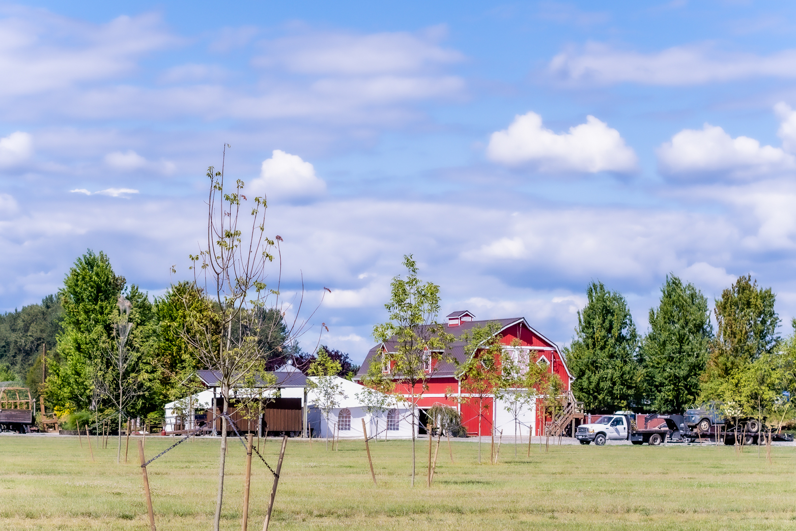 Stocker Farm Barn and Venue surrounded by trees. Stocker Farms is in Snohomish, WA. 