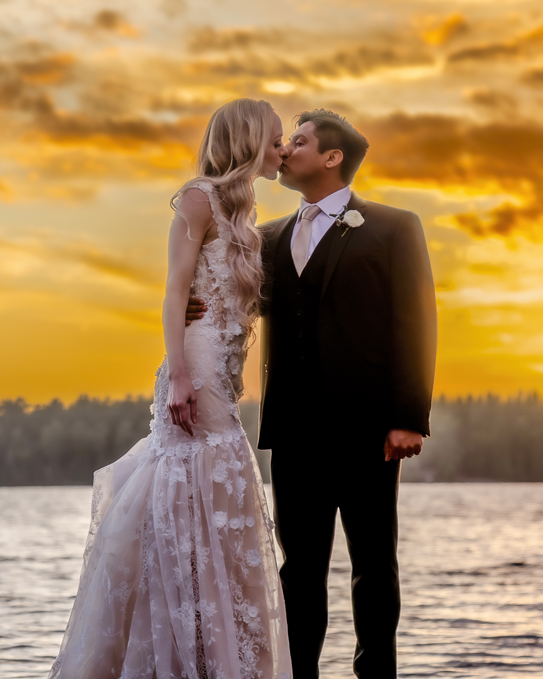 Sunset photo taken just as the sun was setting over the horizon on a wedding day. A photo like this often has to happen within a 15 minute window.