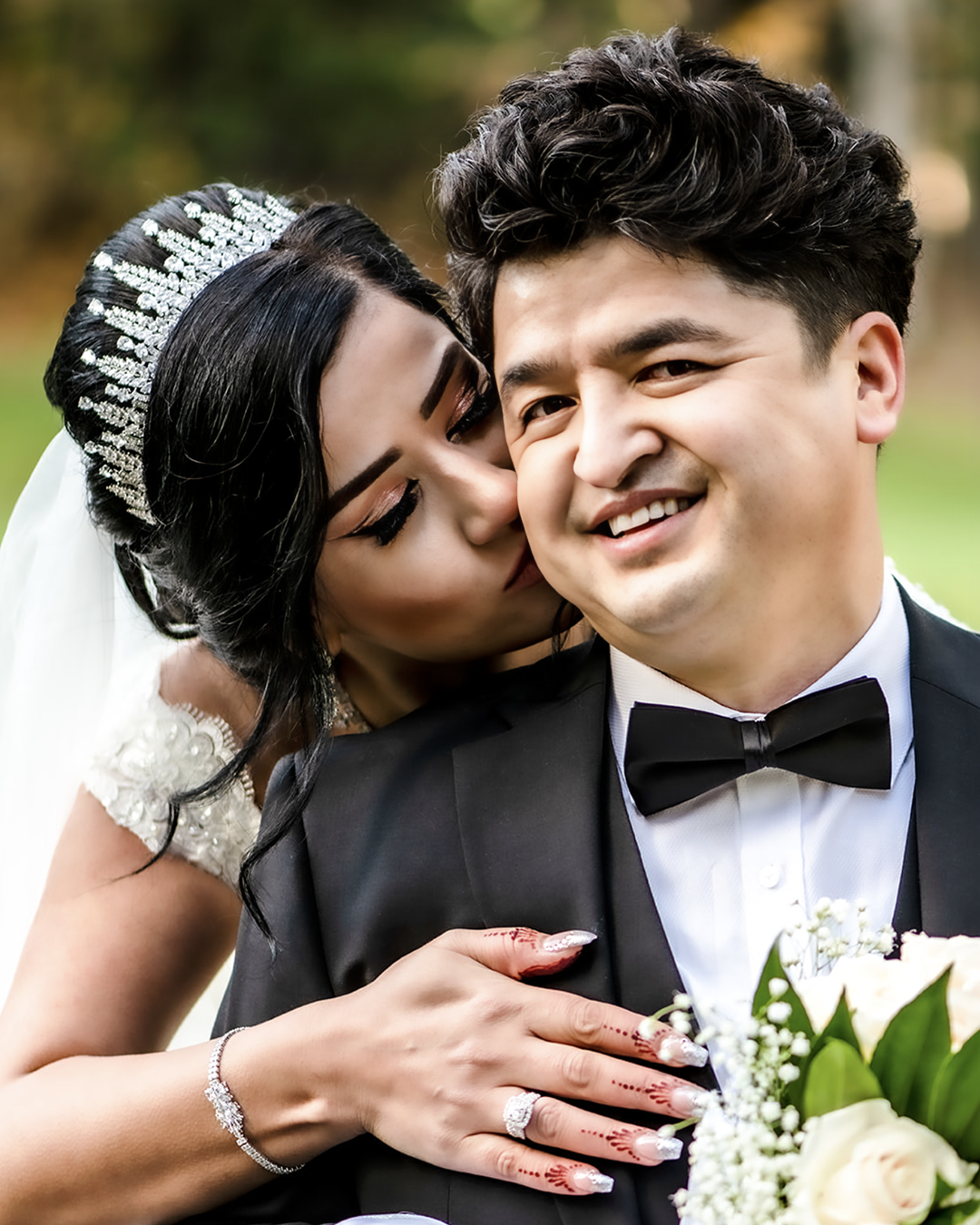 Bride kisses her husband at the Lake Wilderness Lodge in Maple Valley on their wedding day.