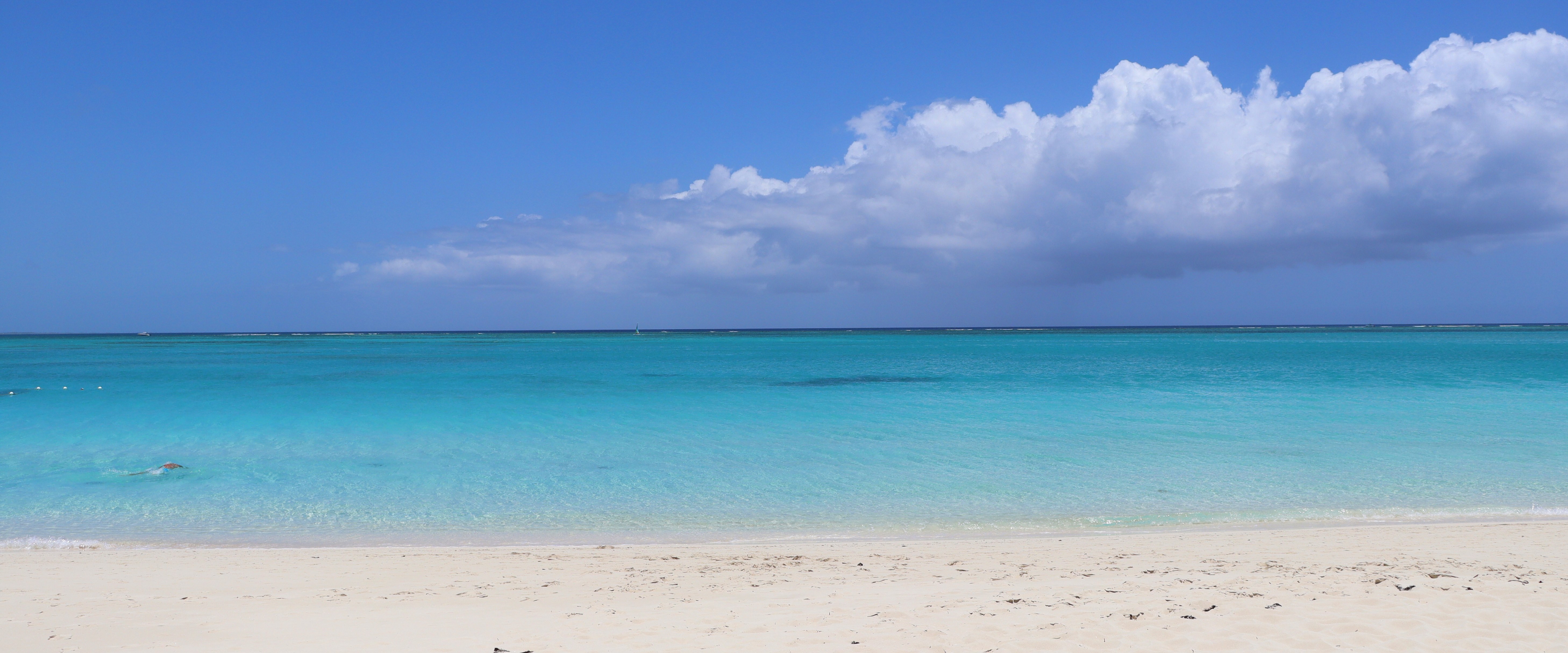 White sand and clear turquoise water at Grace Bay, Providenciales, Turks and Caicos