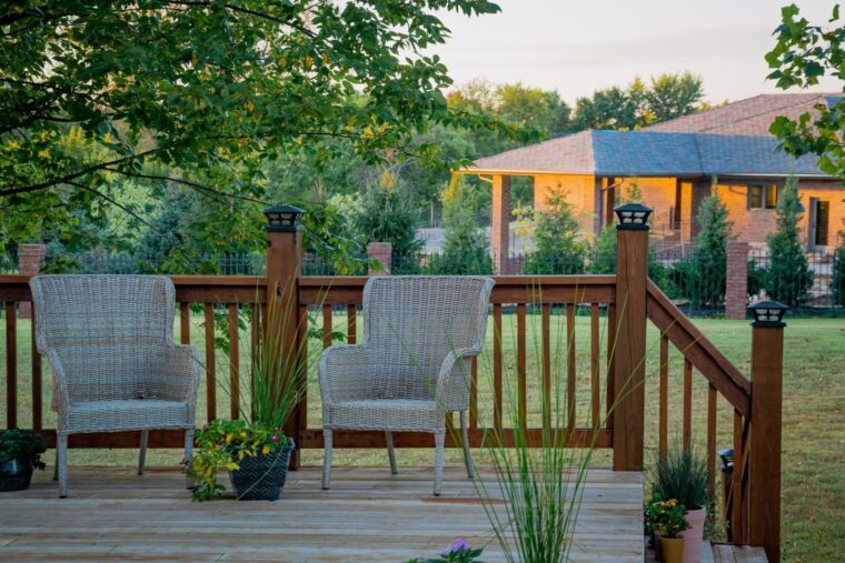 Exterior wood stain on fence, deck, and pergola in Oklahoma protecting wood from weather damage