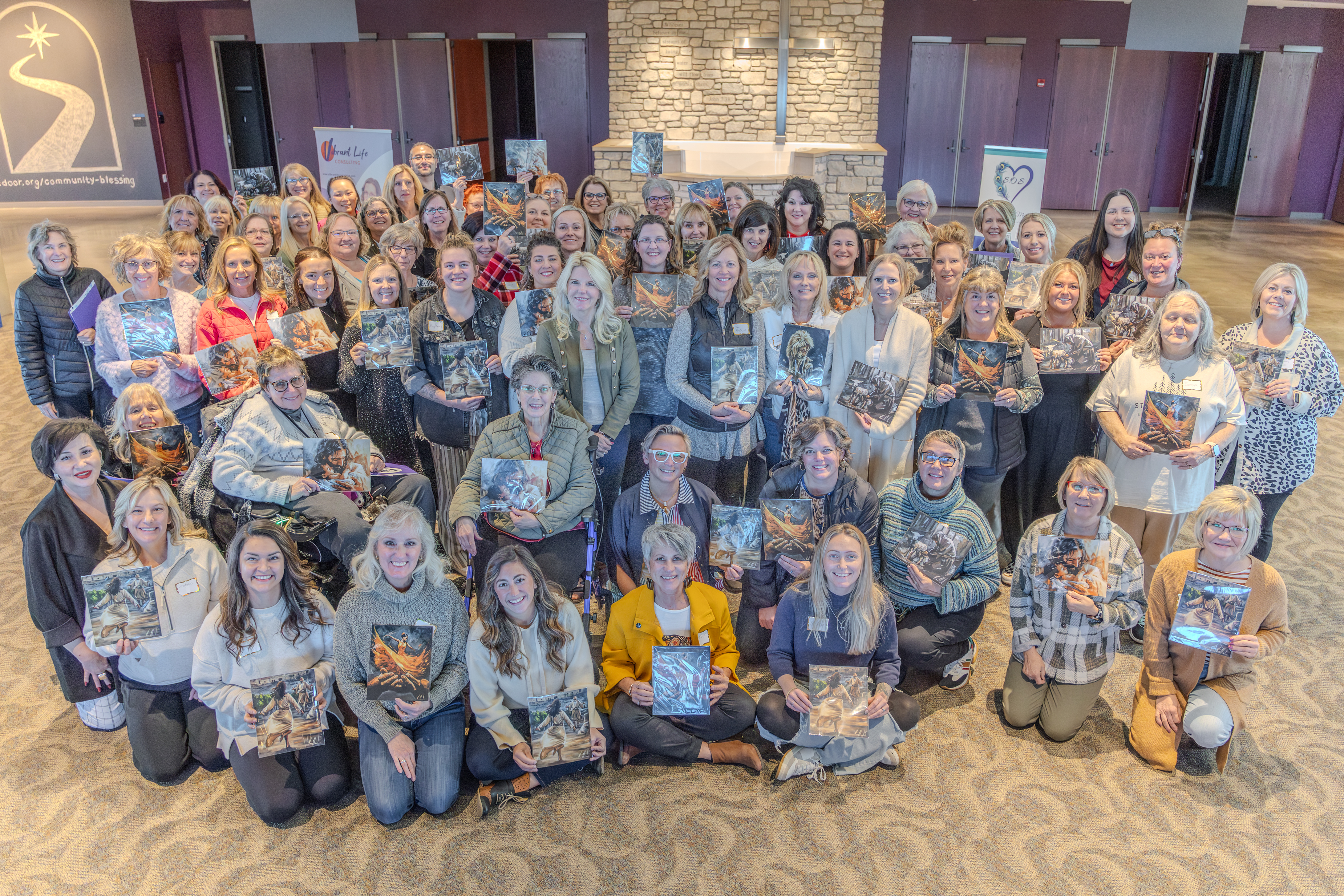 Women worshipping together at a Spark Our Spirit conference