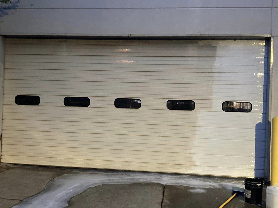 Commercial overhead door and flatwork cleaning