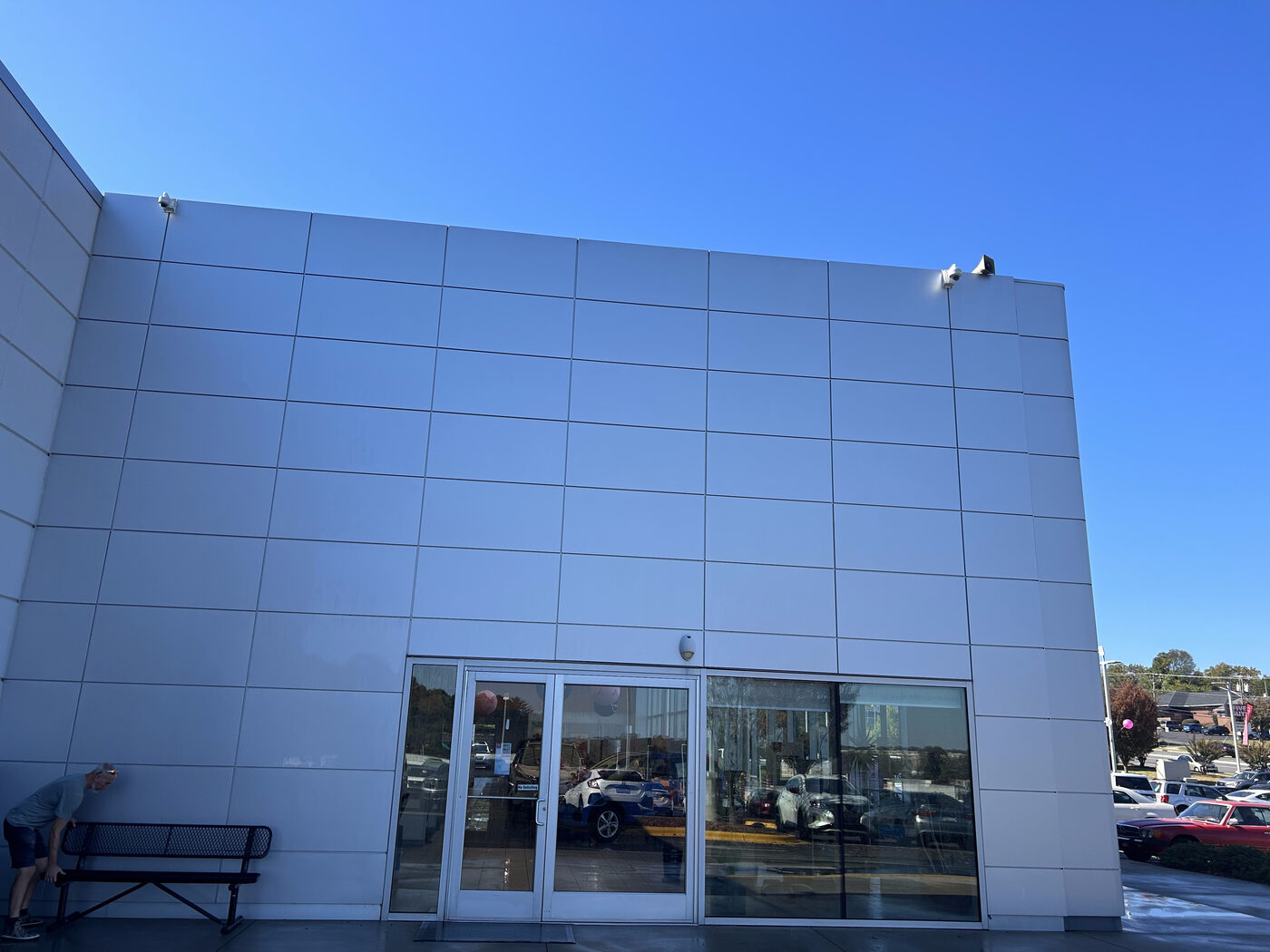 Clean white Alucobond ACM dealership facade