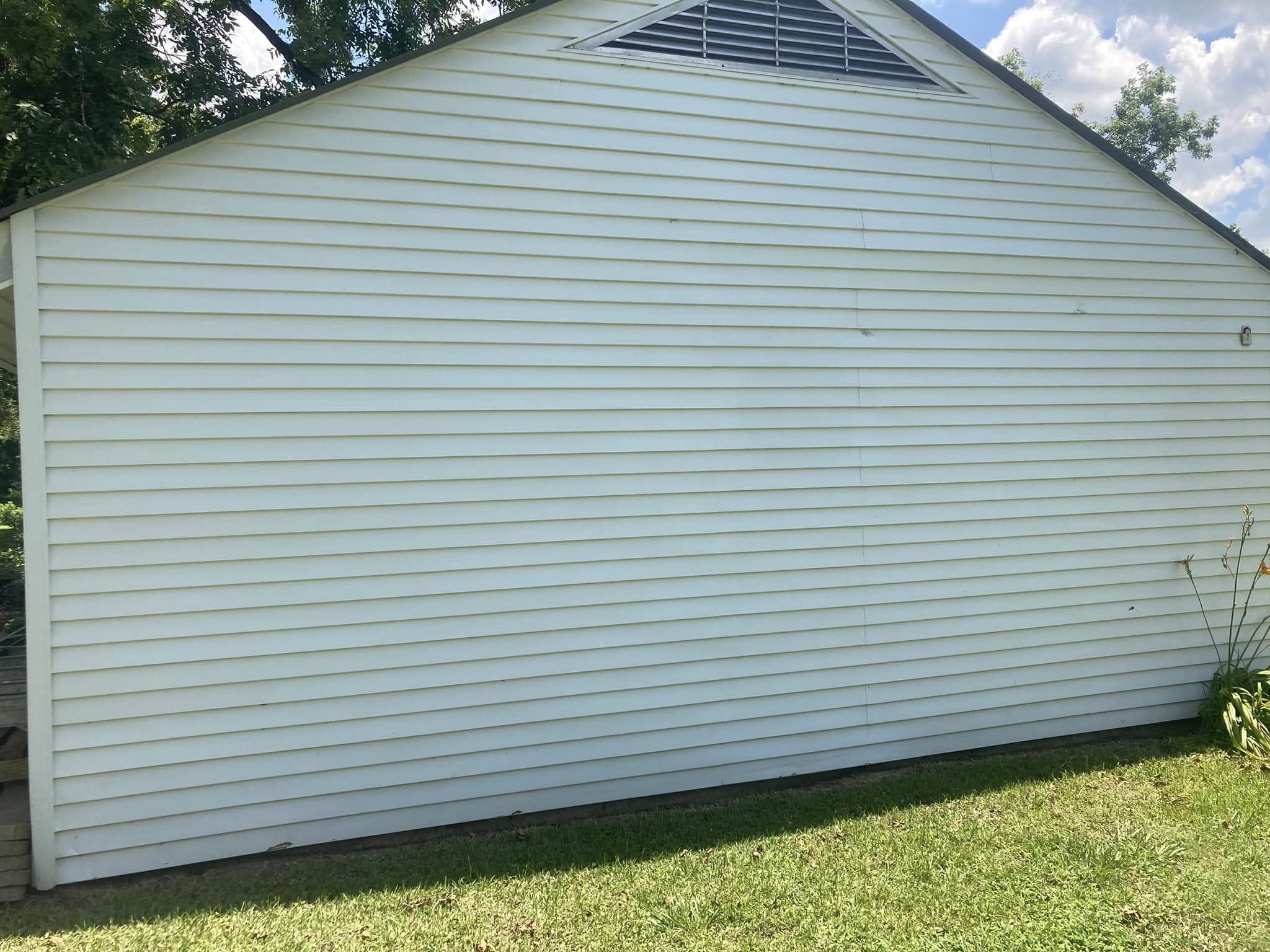 Soft-washed home exterior with mold and algae removed