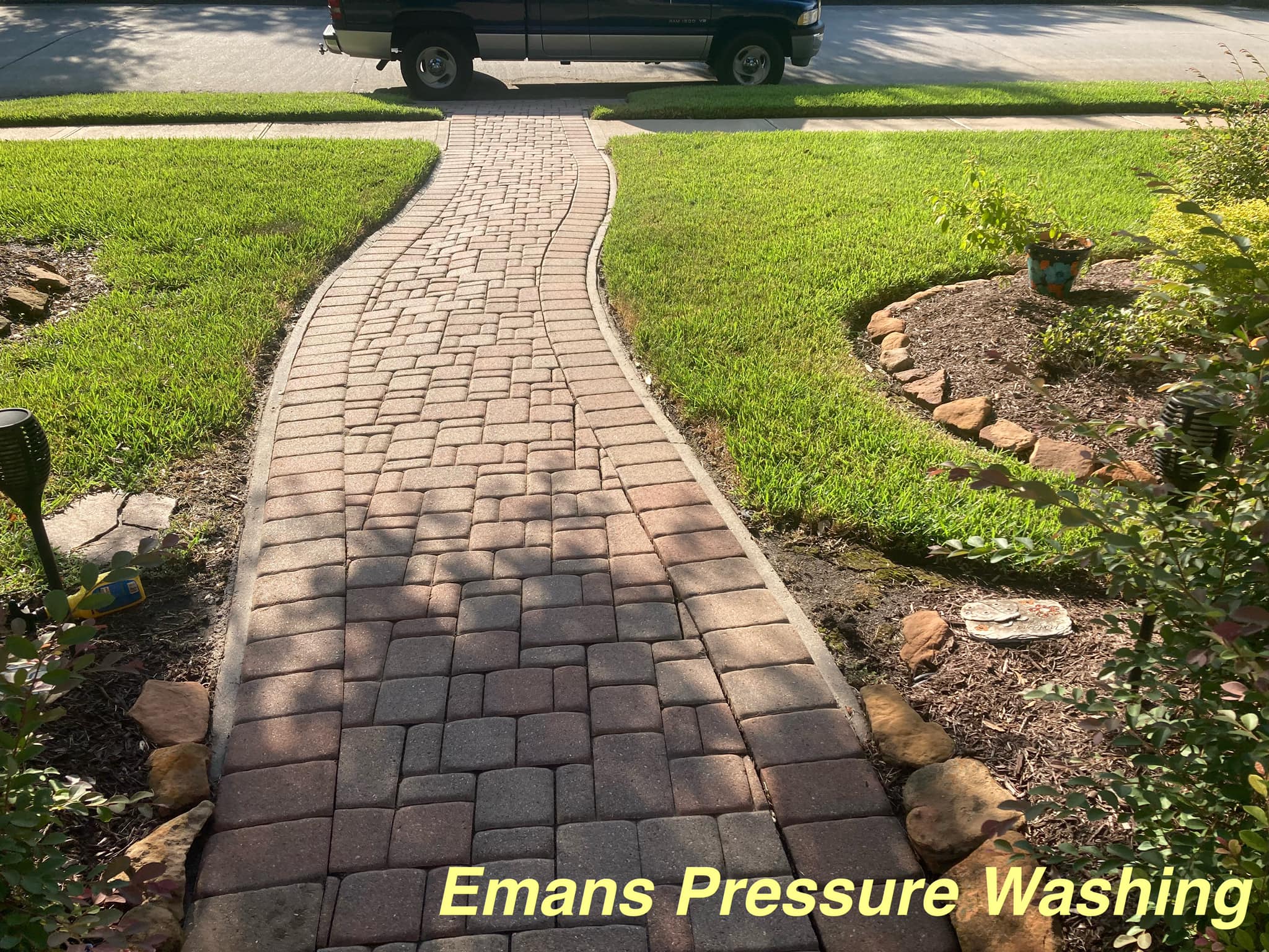 Brick wall with organic growth removed by professional cleaning