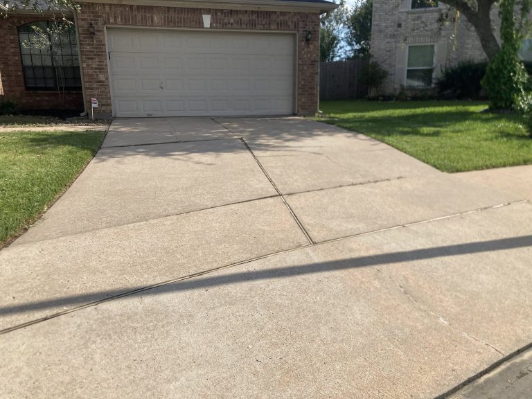 Freshly cleaned concrete driveway surface