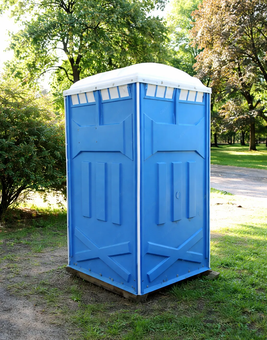 Technician cleaning residential septic tank