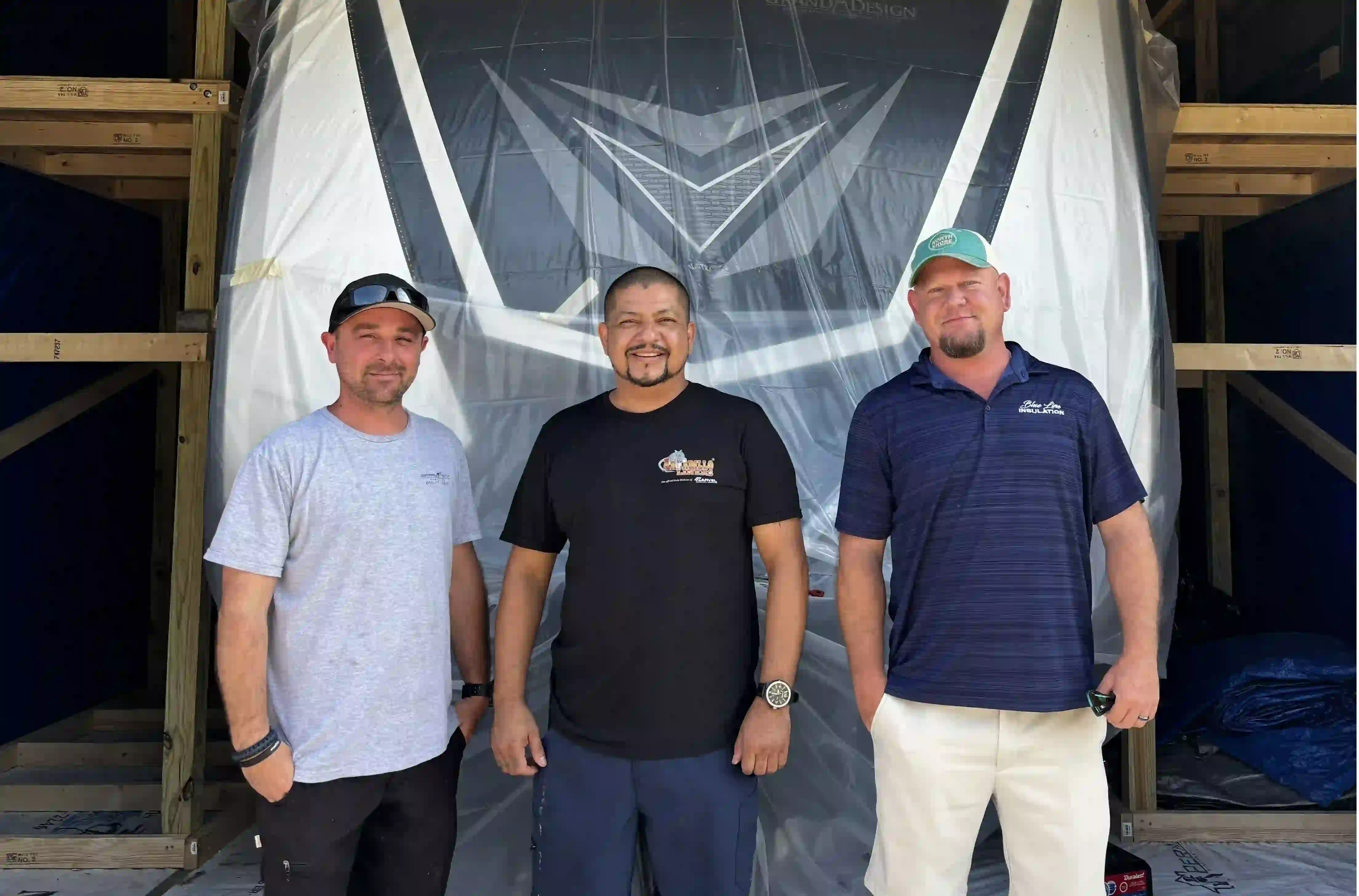 Local Florida RV roof coating experts – RV Coatings of Florida team standing in front of protected motorhome