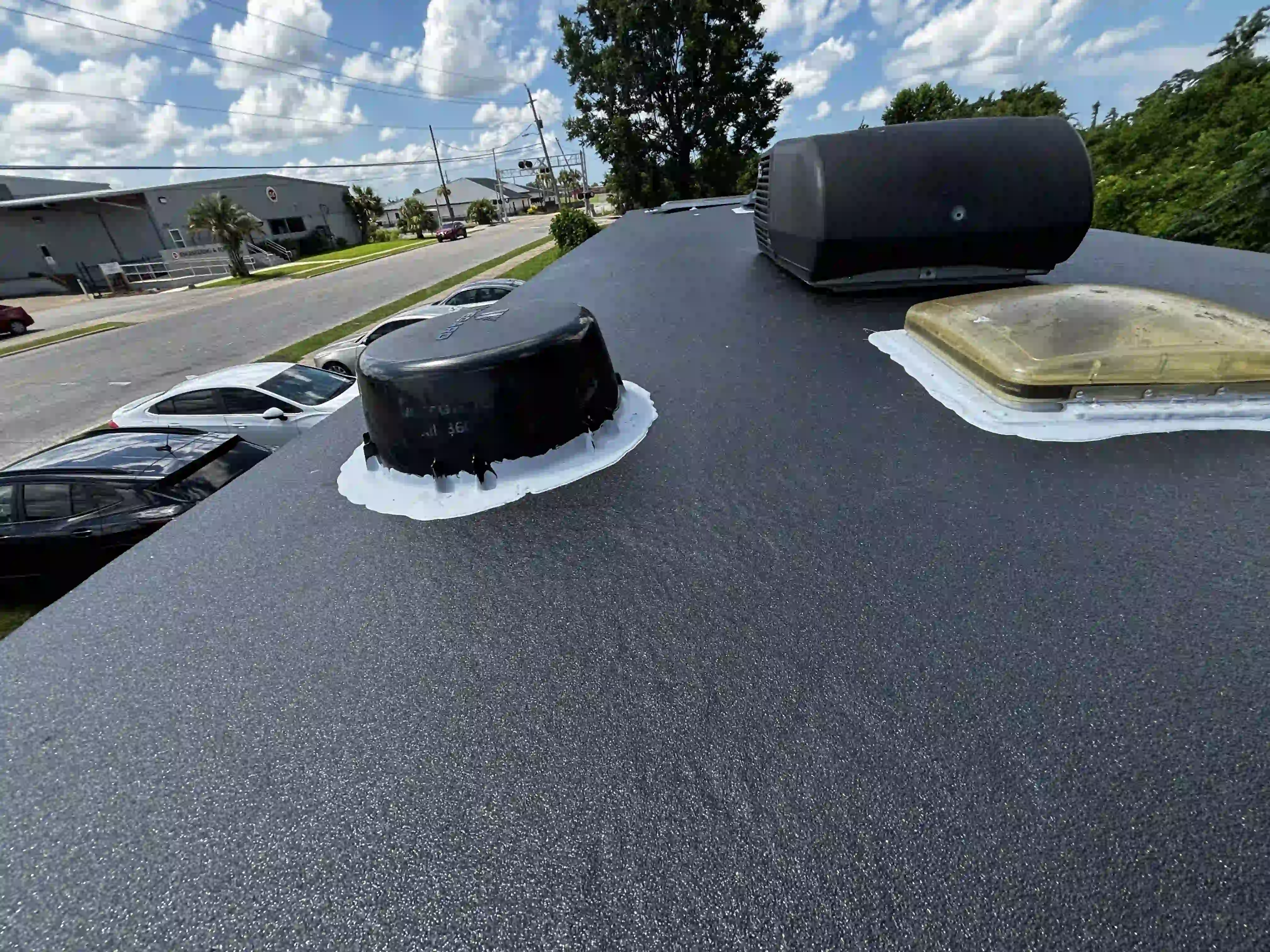 Sealed and coated RV roof in Panama City FL with UV-resistant protective coating applied professionally