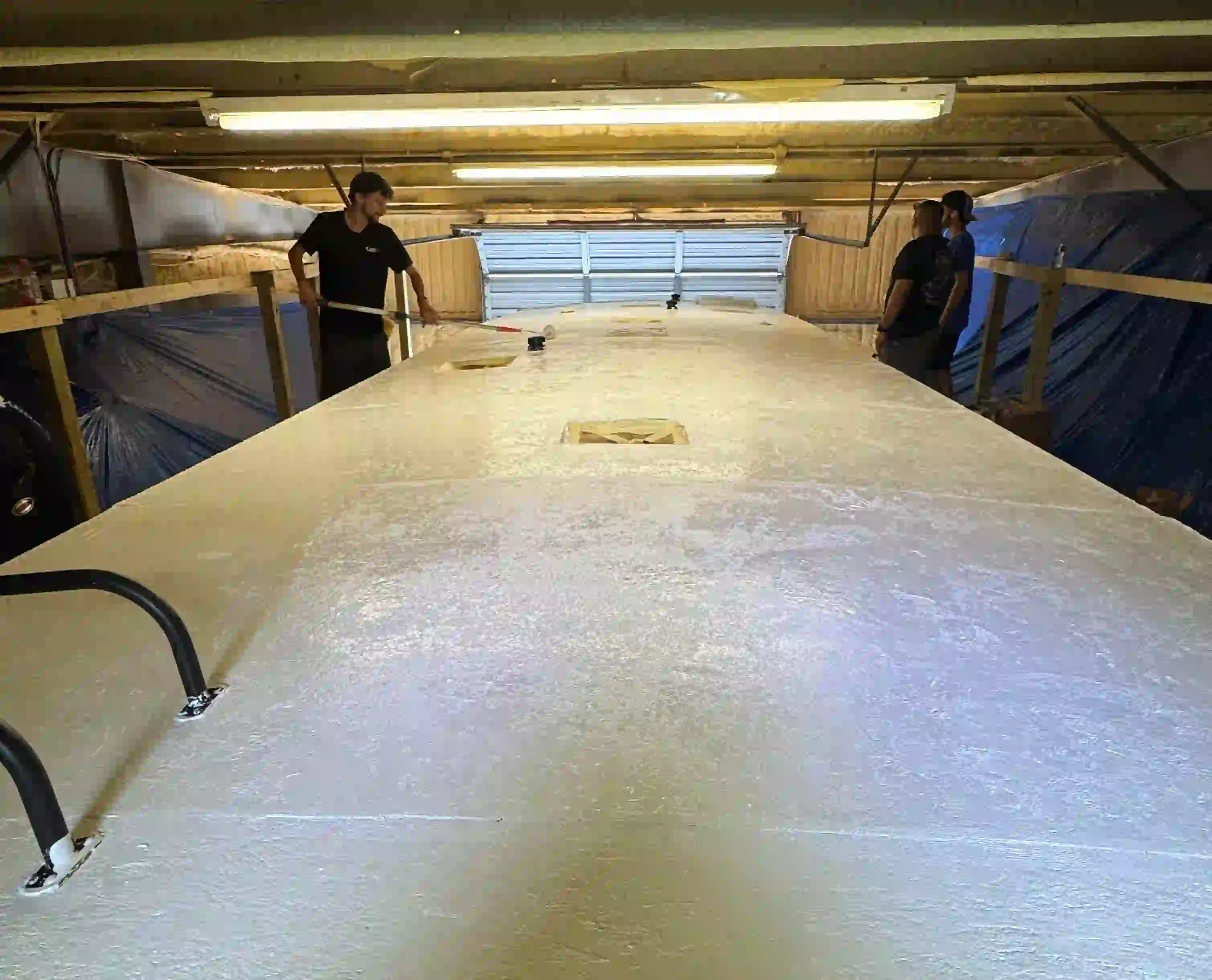 RV roof recoating in progress in Panama City FL to repair sun damage and extend waterproof protection