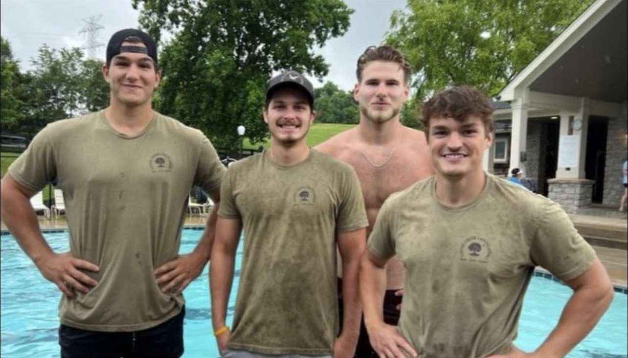 Goose Creek Landscaping team at sponsored swim team event in Franklin, TN