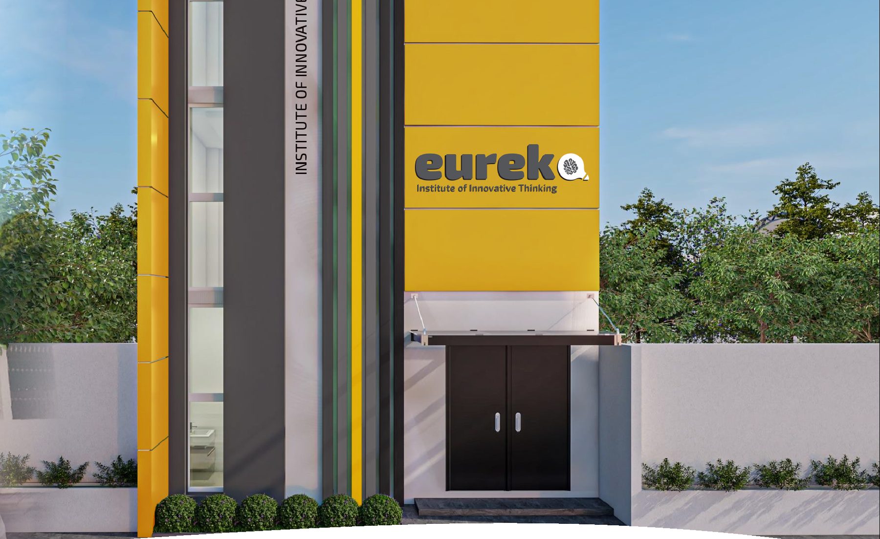 Fachada del Instituto Eureka: torre amarilla con el logotipo de Eureka