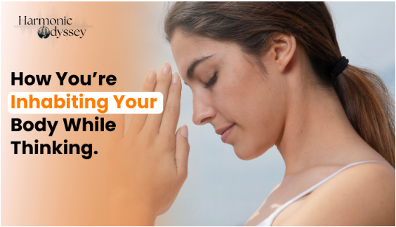 Woman gently touching forehead while thinking, illustrating awareness of bodily sensations and mindful embodiment during thought.