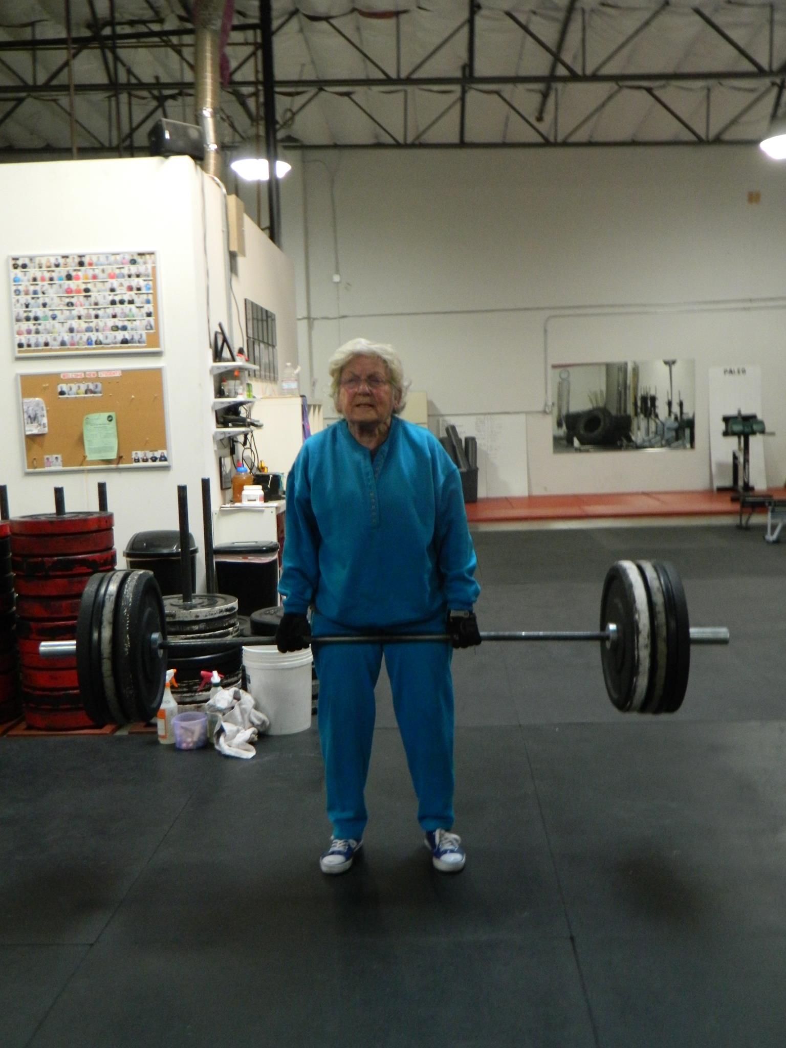 senior woman doing a deadlift
