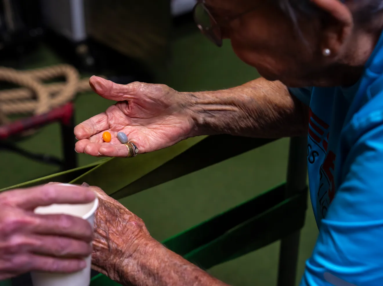 senior woman holding jelly beans in her hand