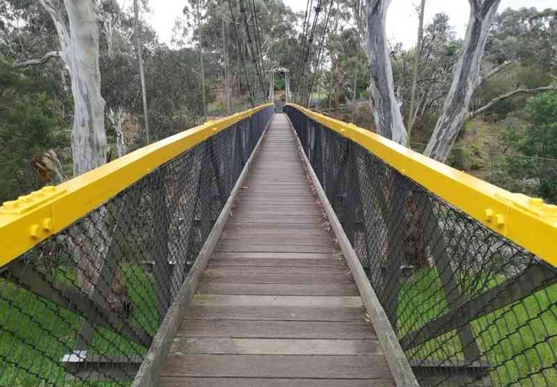Ruffey Trail Suspension Bridge in Fins Reserve Templestowe - iconic wooden footbridge landmark