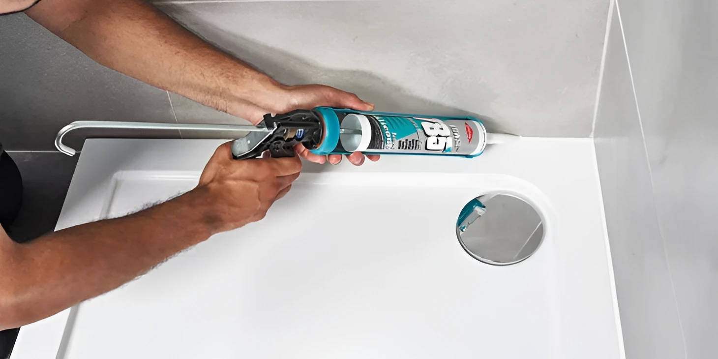 A proffesional plumber applying some adhesive to fill in the gaps. If not done properly it can lead to leaks