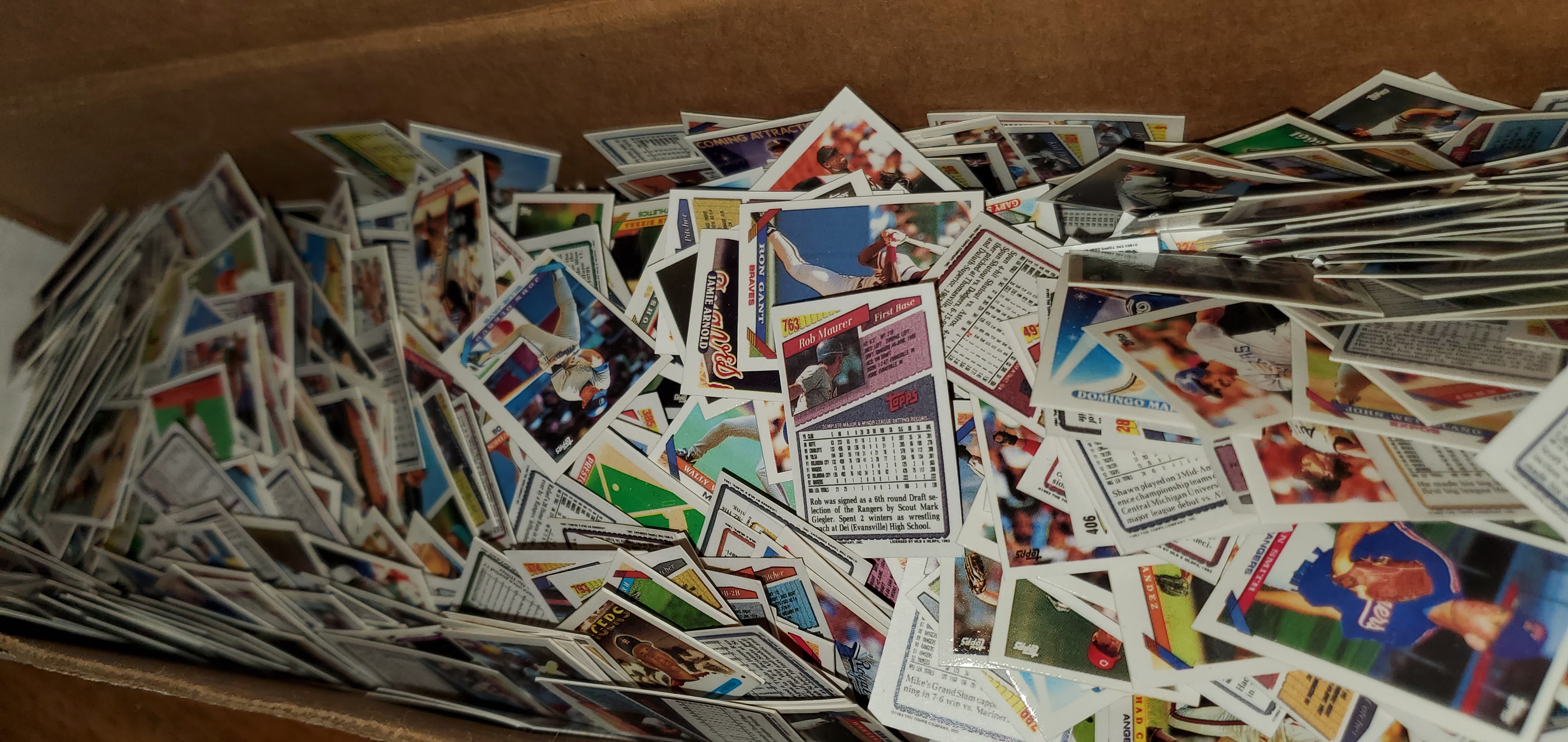 Eric of Atlantic Cards behind a large collection of cards