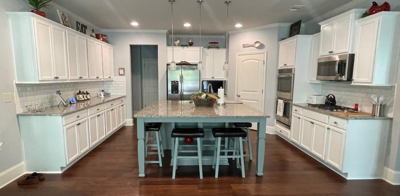 Kitchen interior painting with cabinetry detail, fresh paint on walls and cabinet surfaces by Earthly Matters
