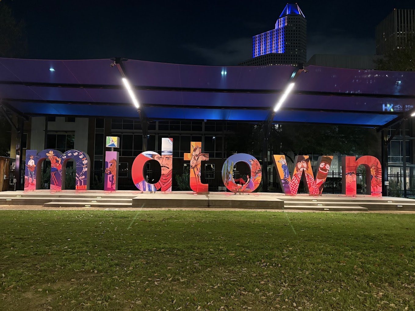 Midtown Houston sign at night