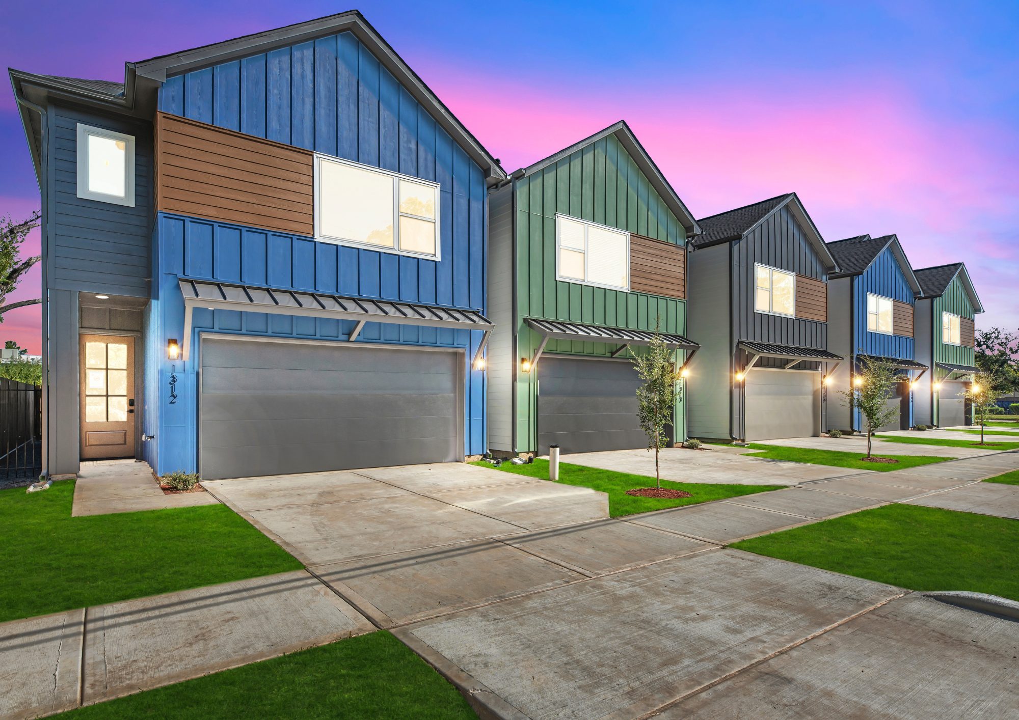 New townhomes on Neiman Lane at dusk