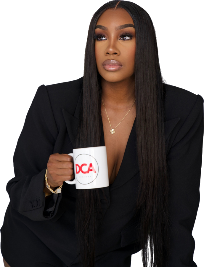Ash Couture holding a Digital Course Agency mug.