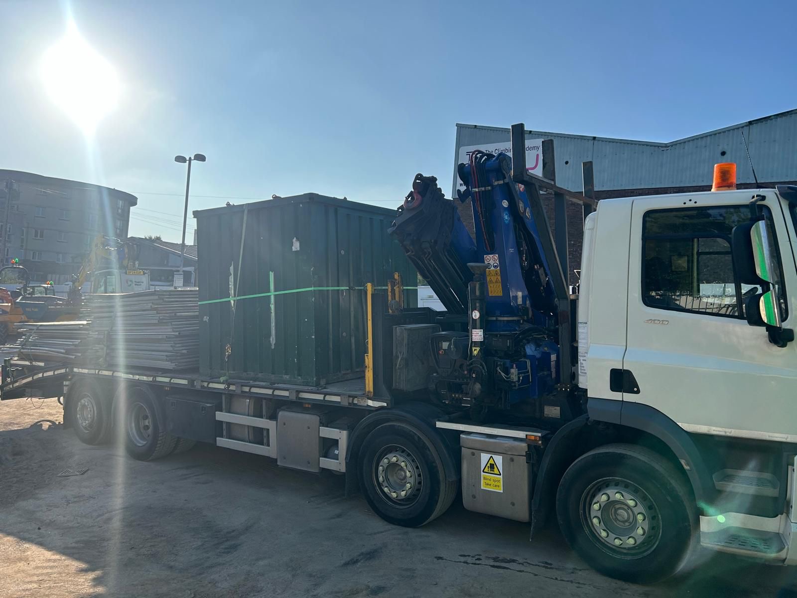 Container moved by HIAB truck