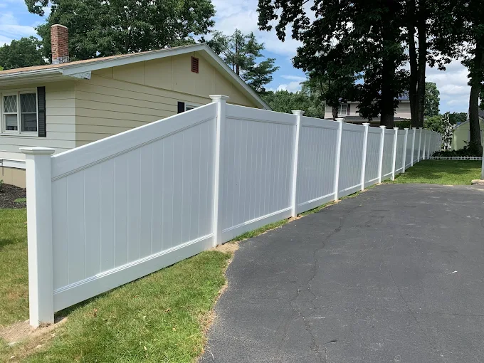 Black Aluminum Fence on Stone Wall