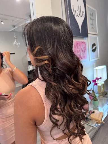 Soft partial highlights for subtle brightness at Bodza Beauty Hair Studio