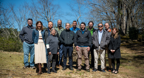 Full SIP Oasis team standing together outdoors for a group portrait