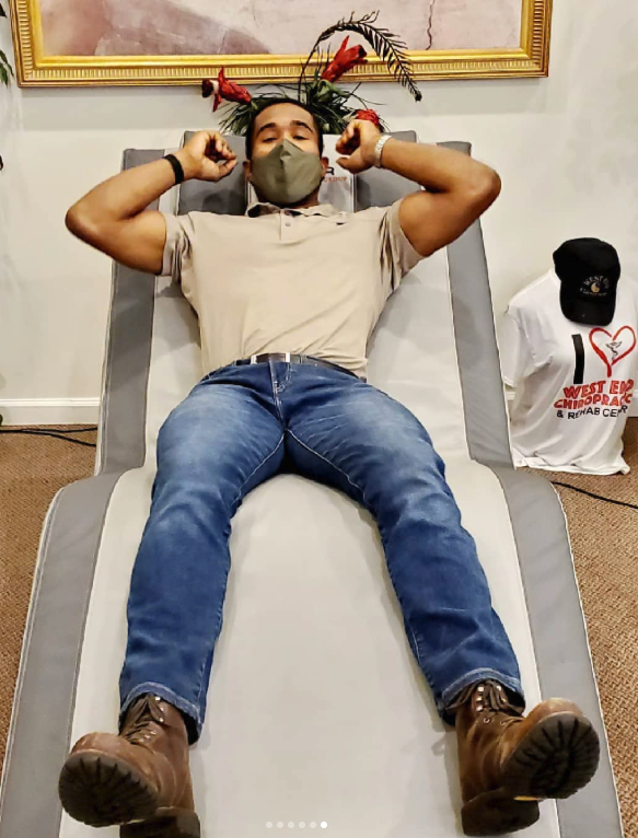 Patient relaxing on a BEMER therapy lounger at West End Chiropractic in St. Louis