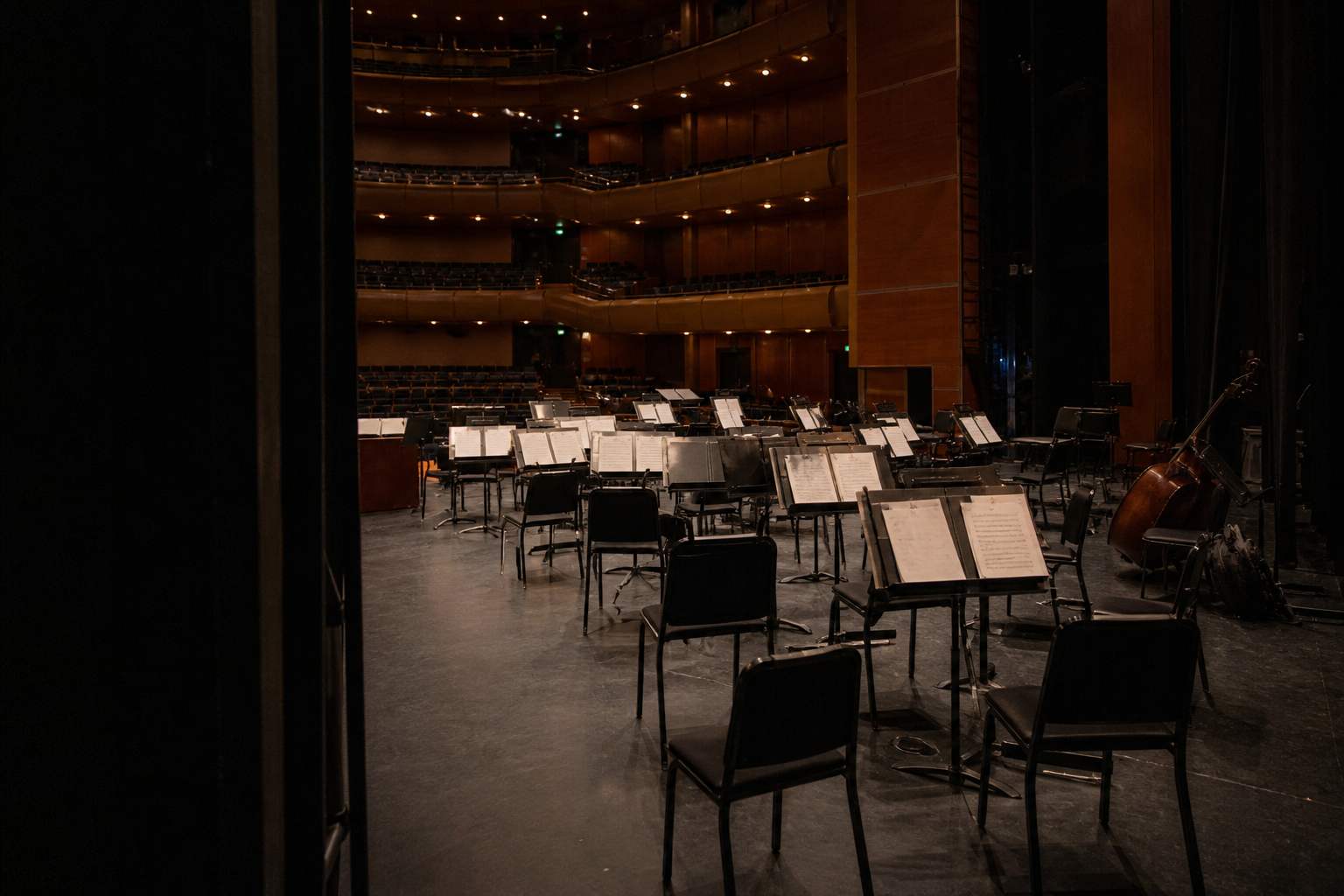 Empty concert hall stage seen from the wings after a performance Empty concert hall stage seen from the wings after a performance
